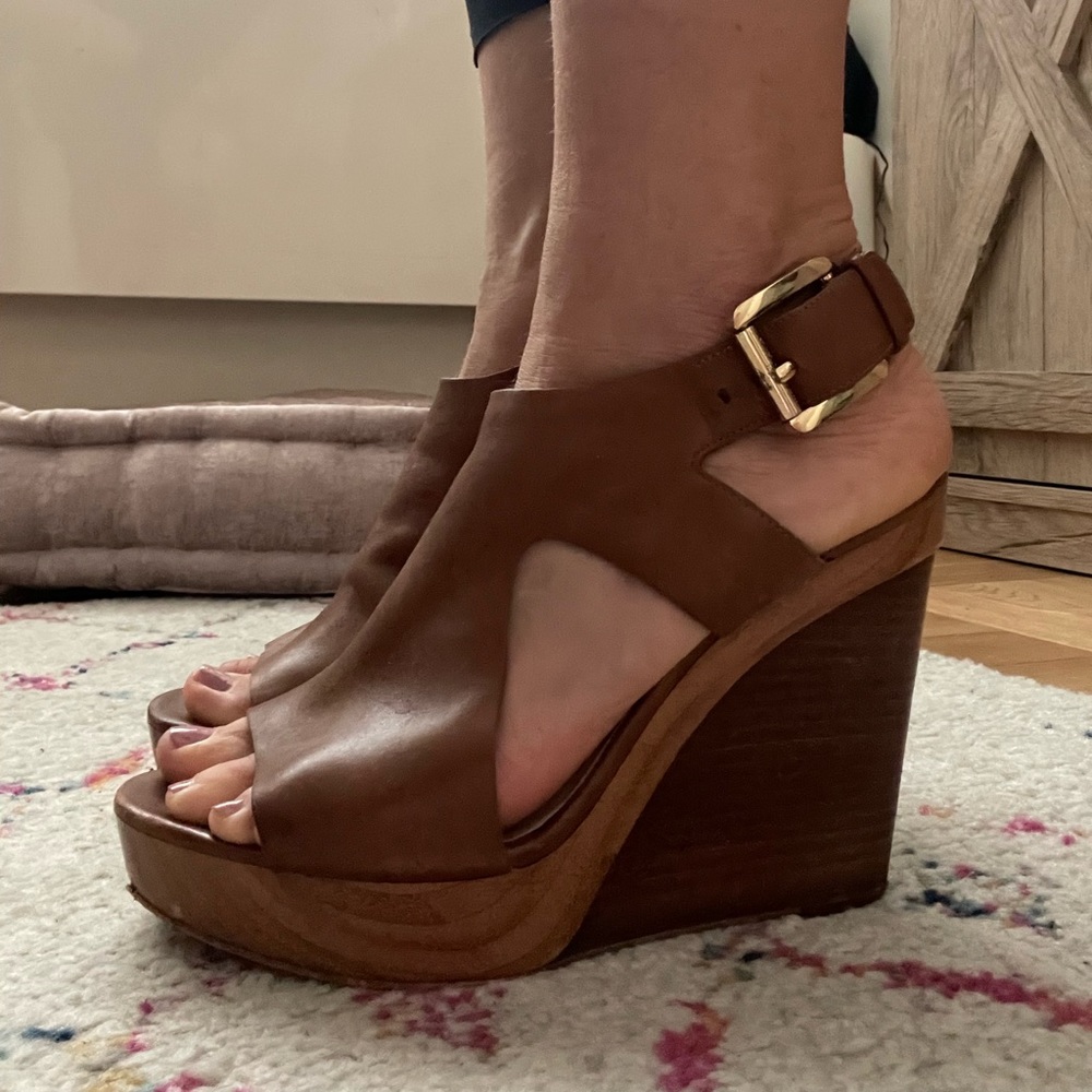 Brown Michael Kors wedges. Extremely comfortable